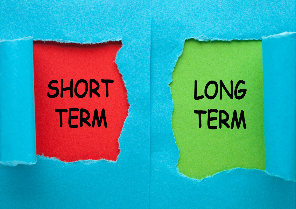 JMR Insurance - image depicting the options short or long term on torn paper