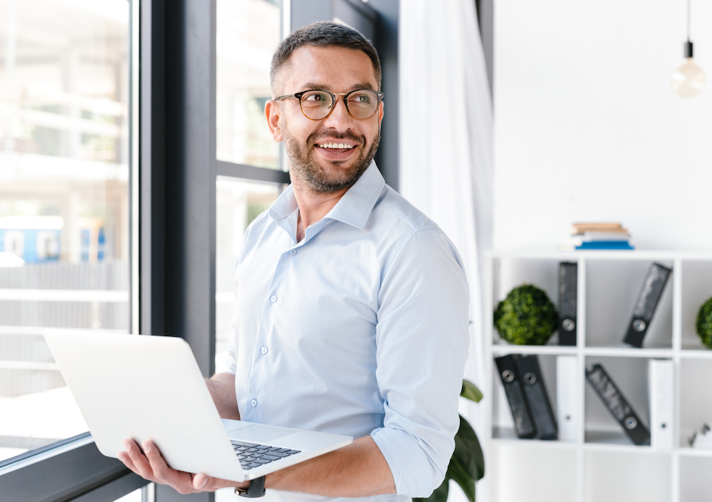JMR Insurance - image of a working in an office